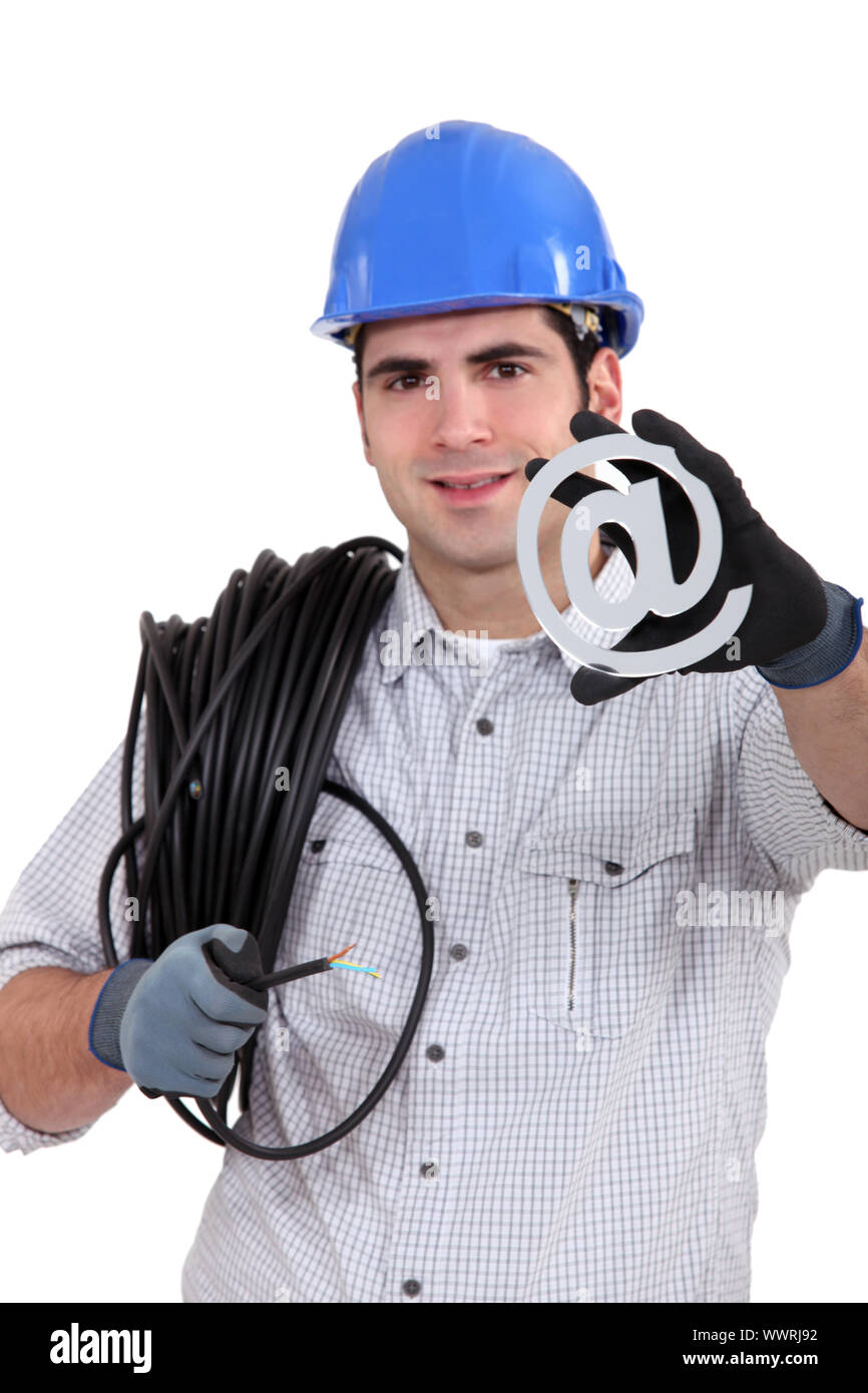 cable guy holding an at sign Stock Photo Alamy