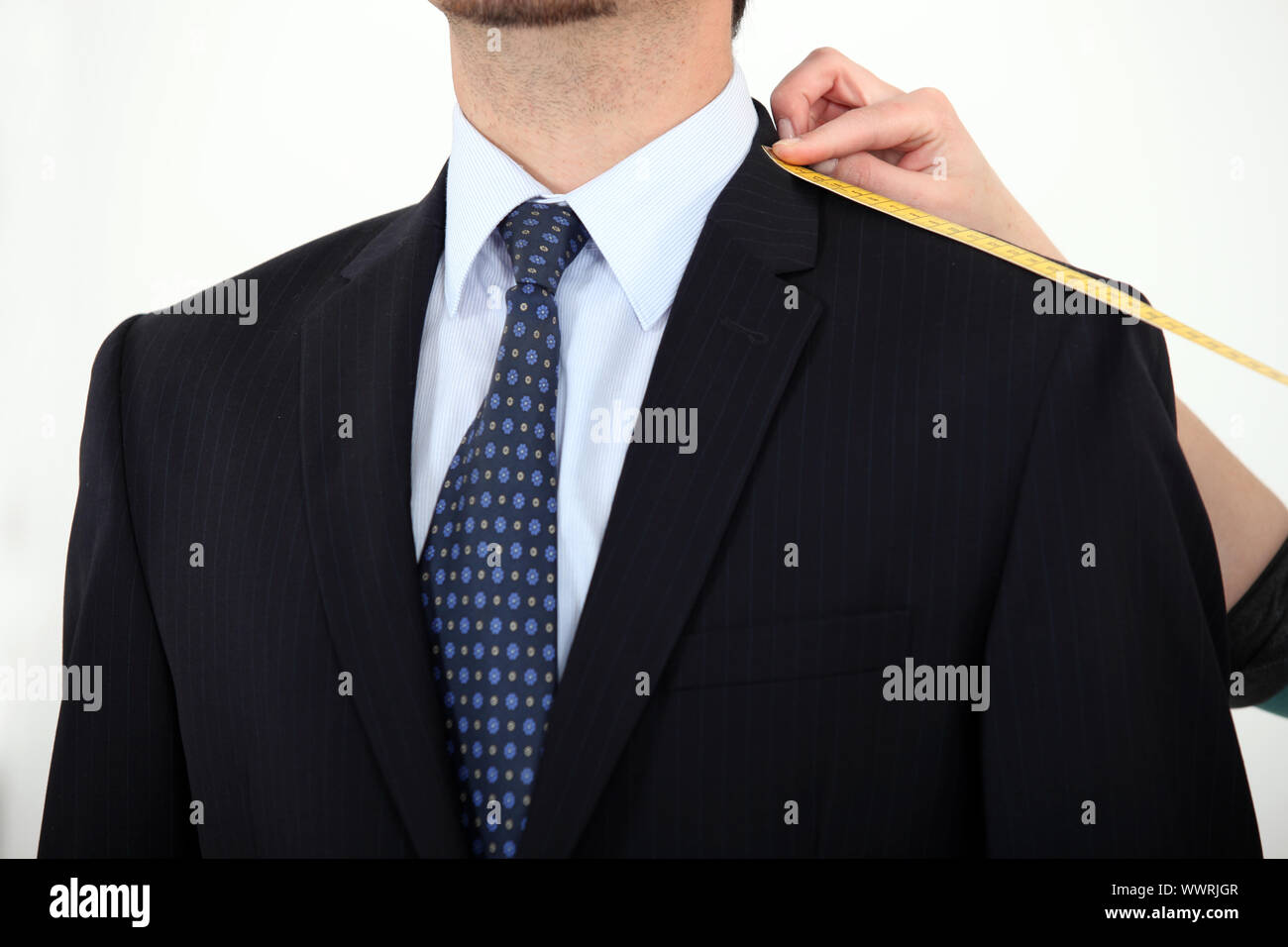 Businessman Being Measured For A Suit Stock Photo Alamy how-to-measure-a-suit-or-shirt-tailor-in-udaipur-boutique-namaste