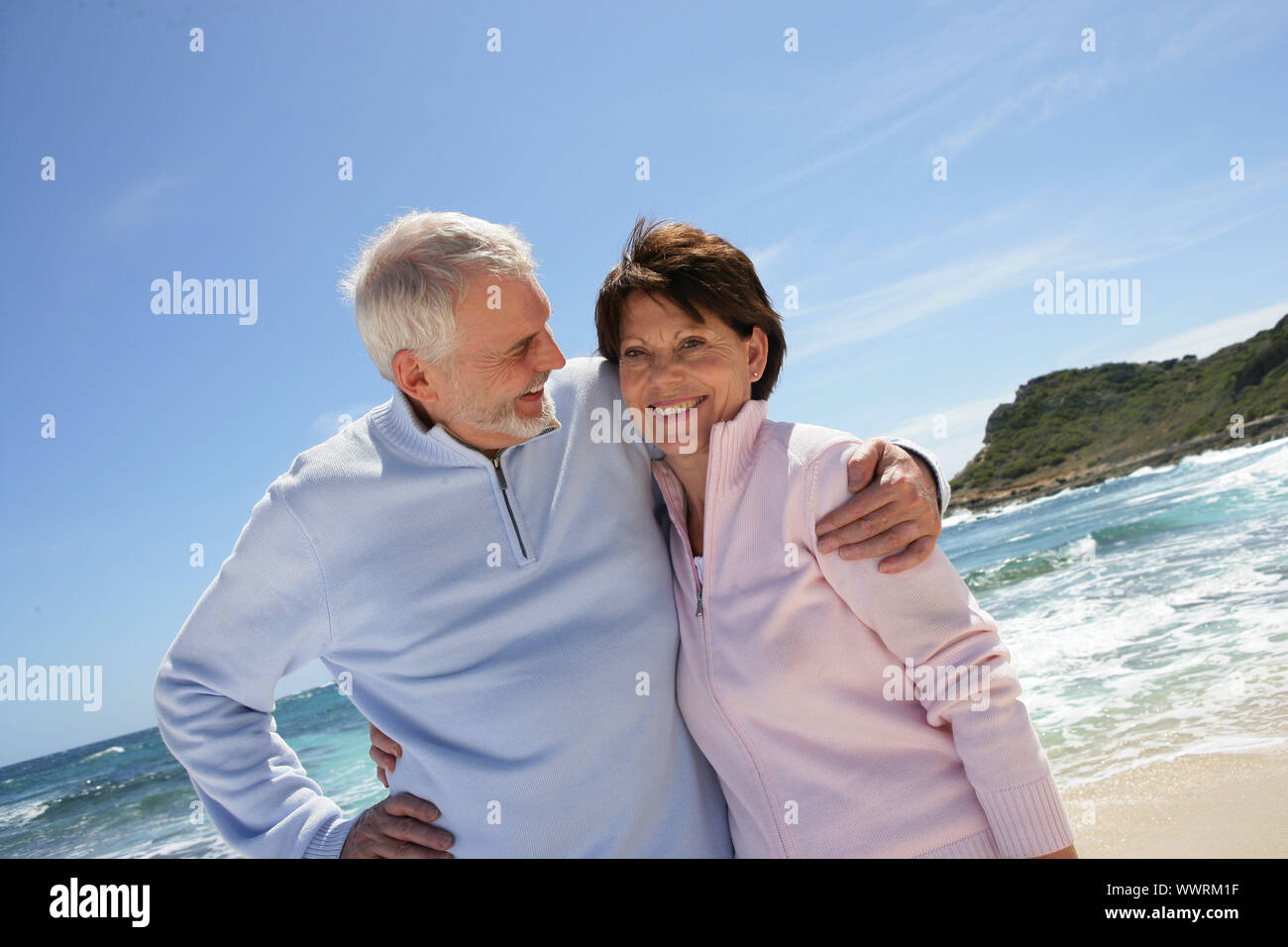 Senior man walking along winter hi-res stock photography and images - Alamy