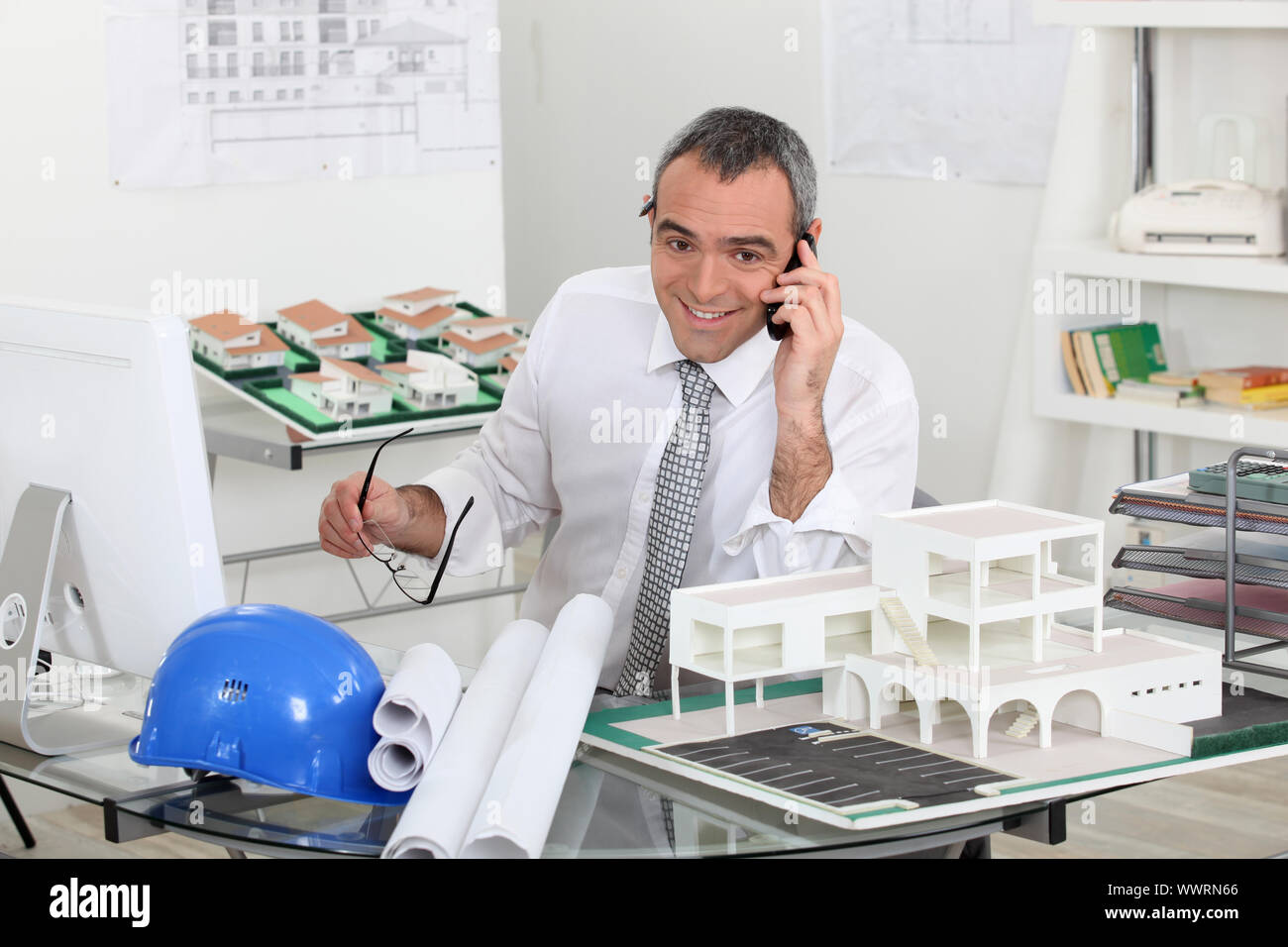 Architect on telephone call Stock Photo - Alamy