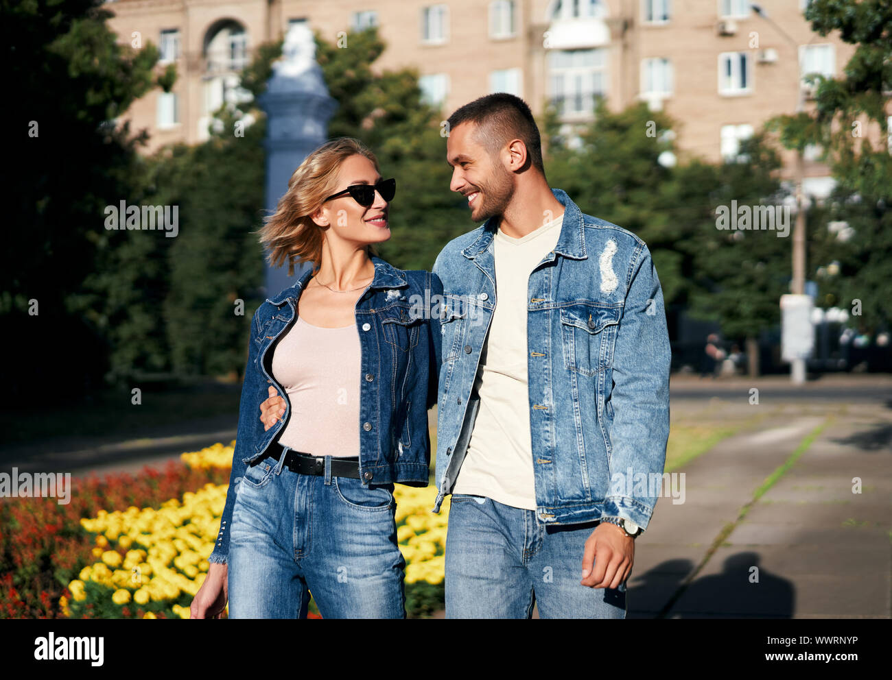 Young couple in love walking outdoors. Relationship, travel concept Stock Photo