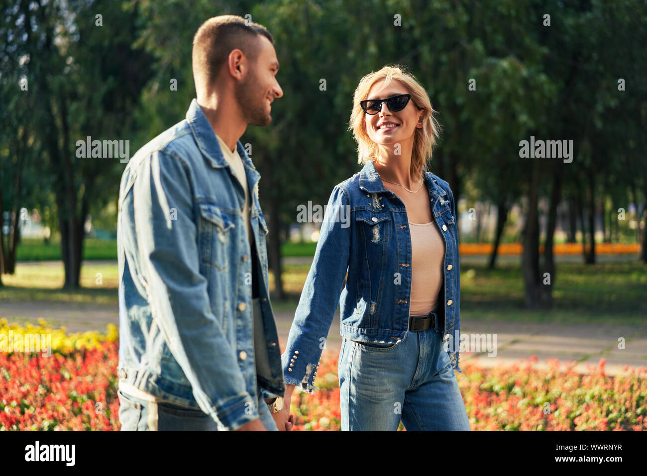 Young couple in love walking outdoors. Relationship, travel concept Stock Photo