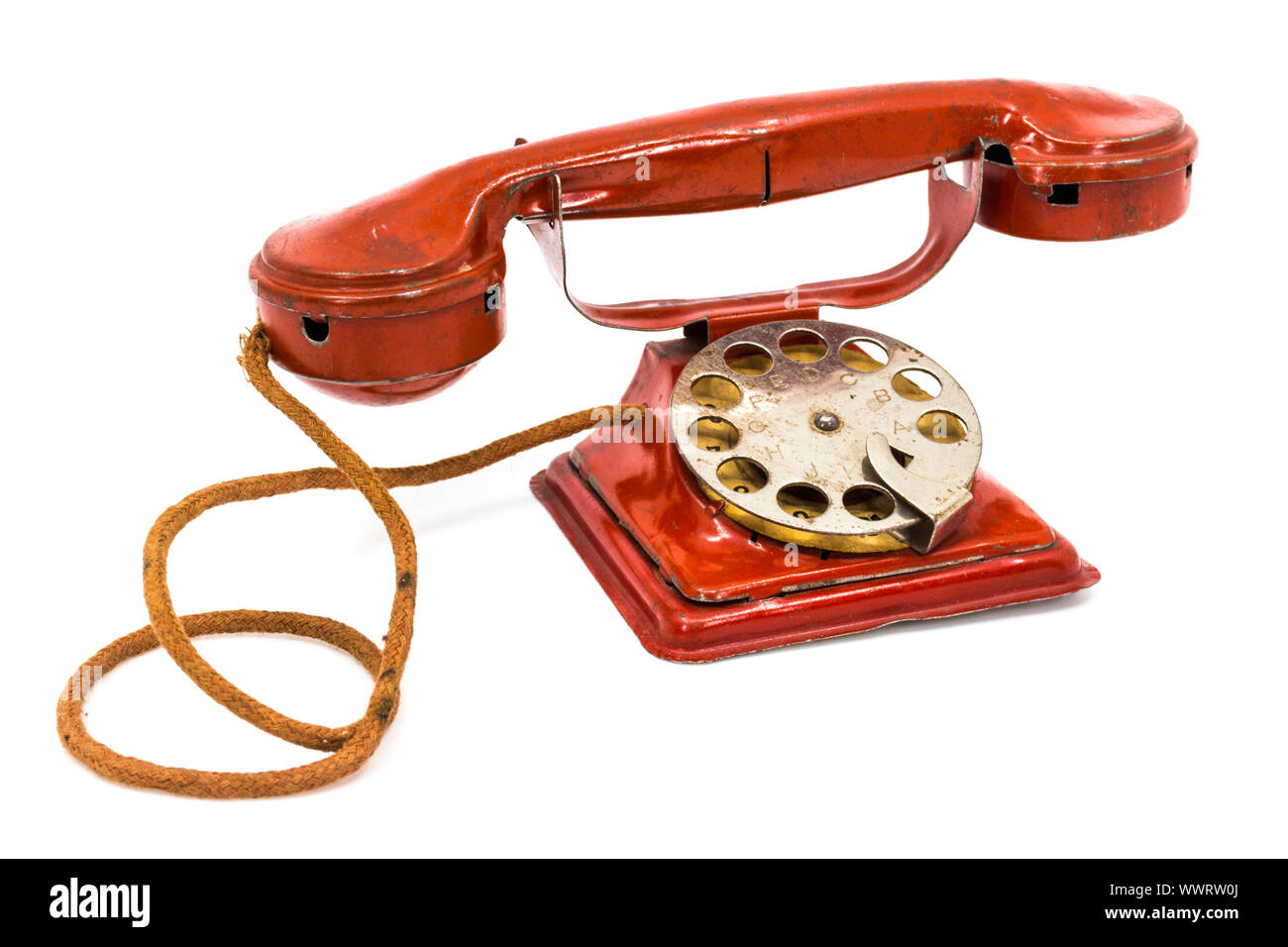 Vintage red metal toy telephone 1940s Stock Photo - Alamy