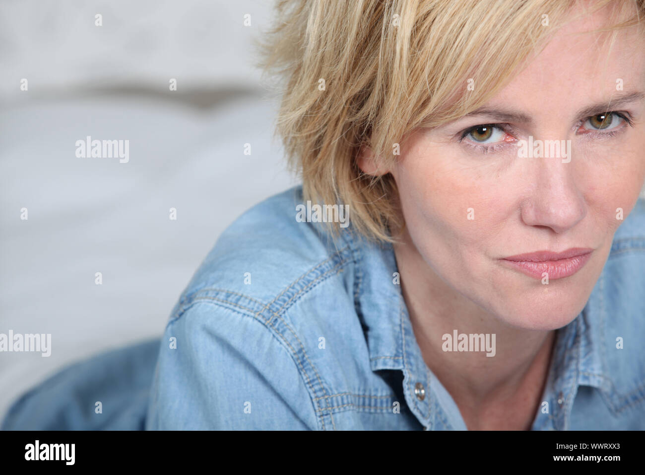Female blonde hair denim hi-res stock photography and images - Alamy