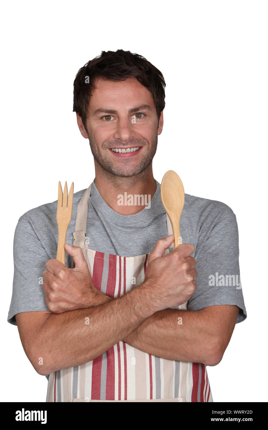 Man holding knife fork ready hi-res stock photography and images - Alamy