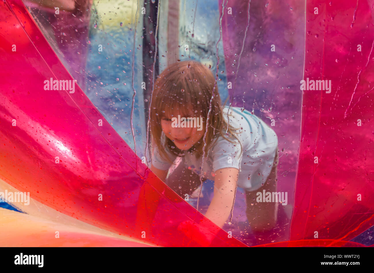 girl in water balloons zorb on the water Stock Photo Alamy