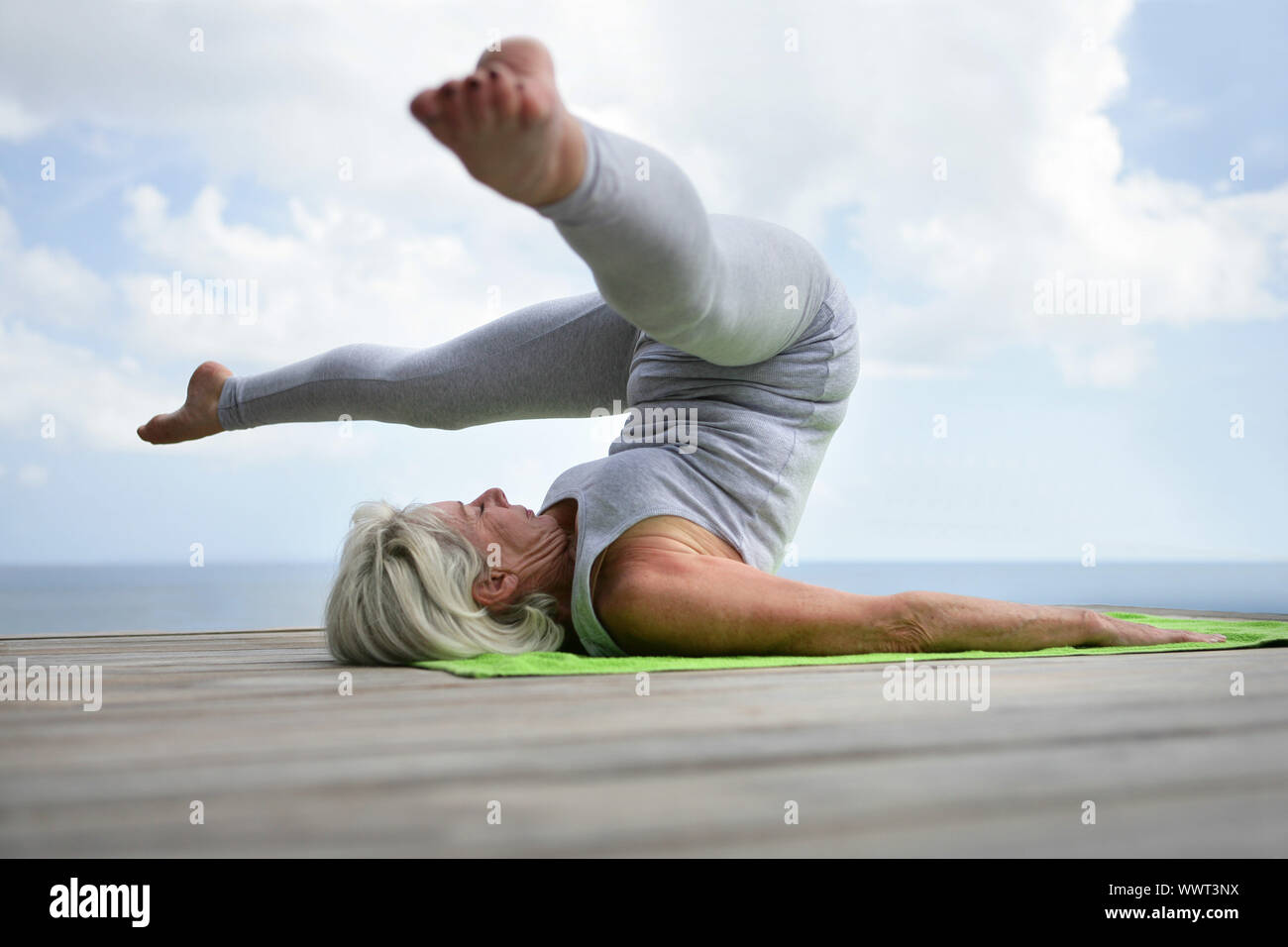 Yoga position legs spread hi-res stock photography and images - Alamy