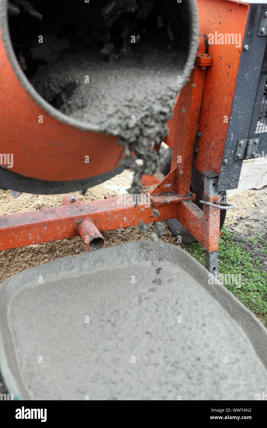 Wheelbarrow full of wet cement Stock Photo Alamy