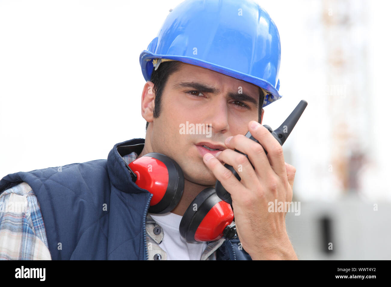 craftsman using a talkie-walkie Stock Photo