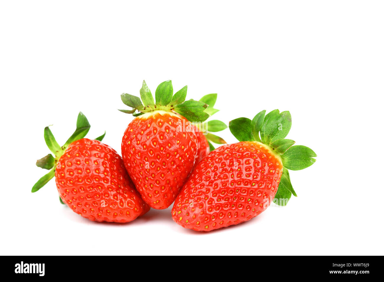 strawberry pile isolated on white background Stock Photo - Alamy