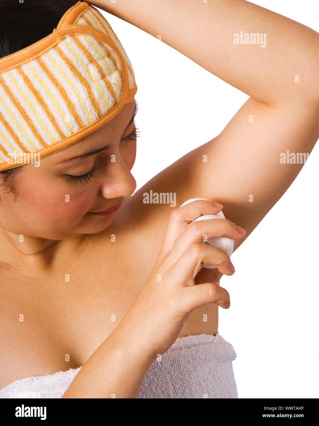 Woman Putting On Underarm Deodorant After A Shower Stock Photo - Alamy