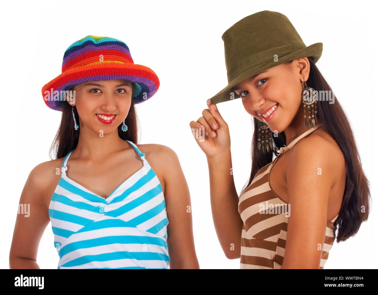 Two Teenage Girls Smiling And Posing In Summer Hats Stock Photo - Alamy