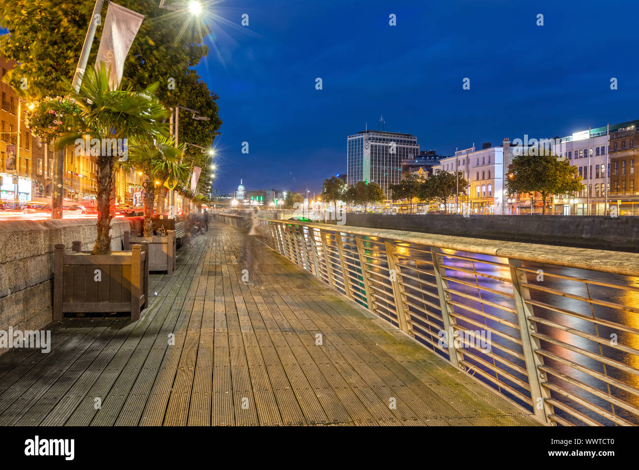 Walkway on the Wellington Quay by the Liffey River in Dublin, Ireland Stock Photo