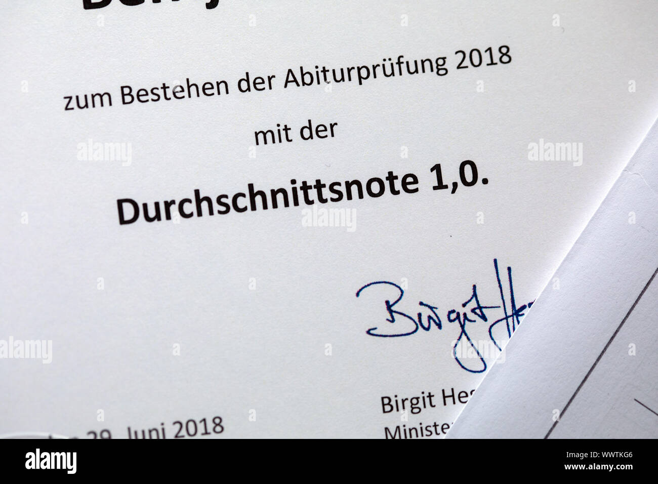 Pokrent, Germany. 16th Sep, 2019. The average grade 1.0 is entered on a certificate for the Abitur certificate. (posed photo) More and more pupils in Germany graduate with a 'one before the comma'. Whereas in 2008 one in five school leavers still had an average grade of at least 1.9, by 2018 it was already more than one in four, as the 'Rheinische Post' reported with reference to a survey it conducted in all 16 federal states. Credit: Jens Büttner/dpa-Zentralbild/dpa/Alamy Live News Stock Photo