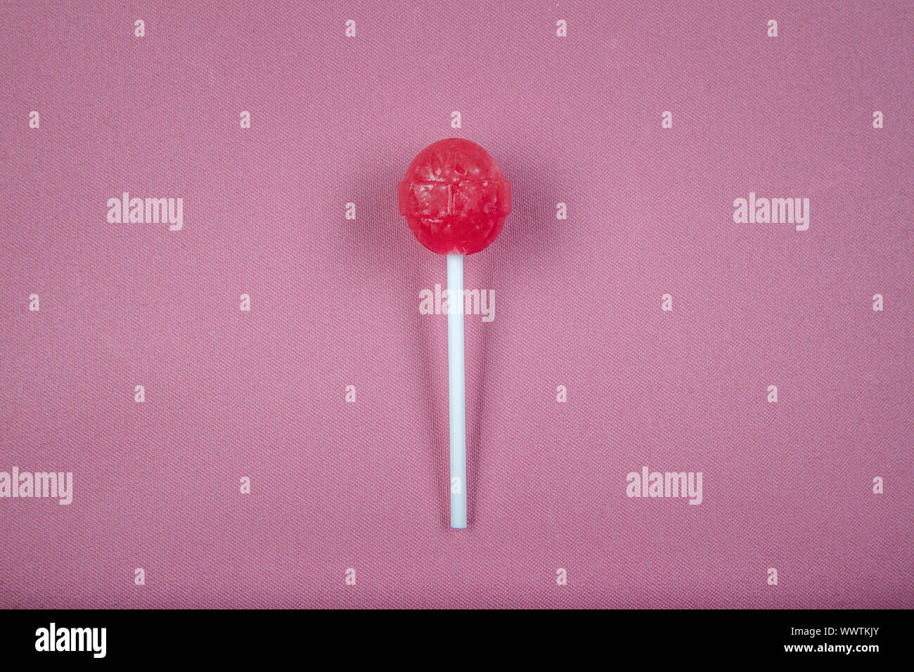 Lollipop on pink background Stock Photo - Alamy