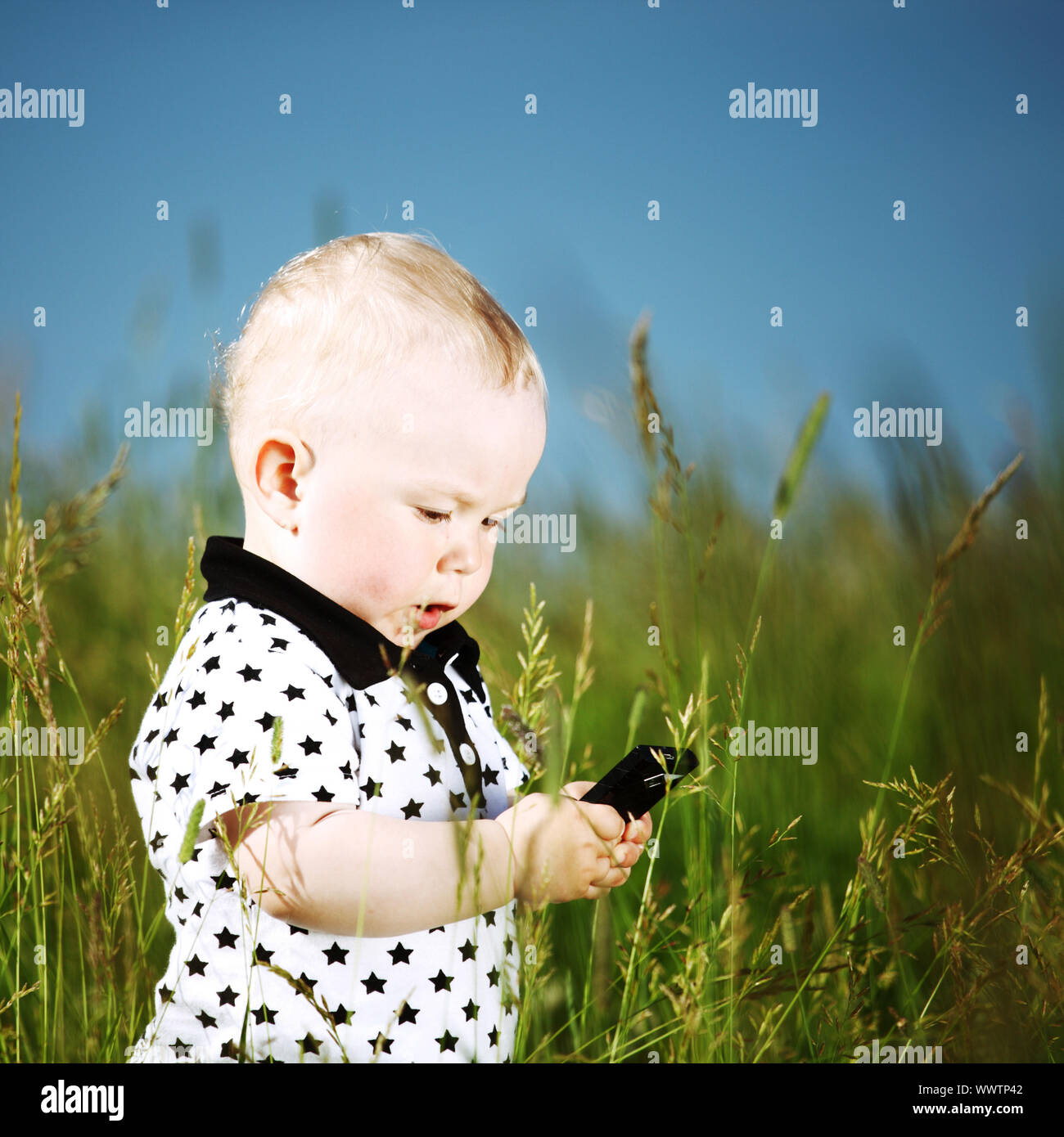 young smile boy call by phone Stock Photo - Alamy