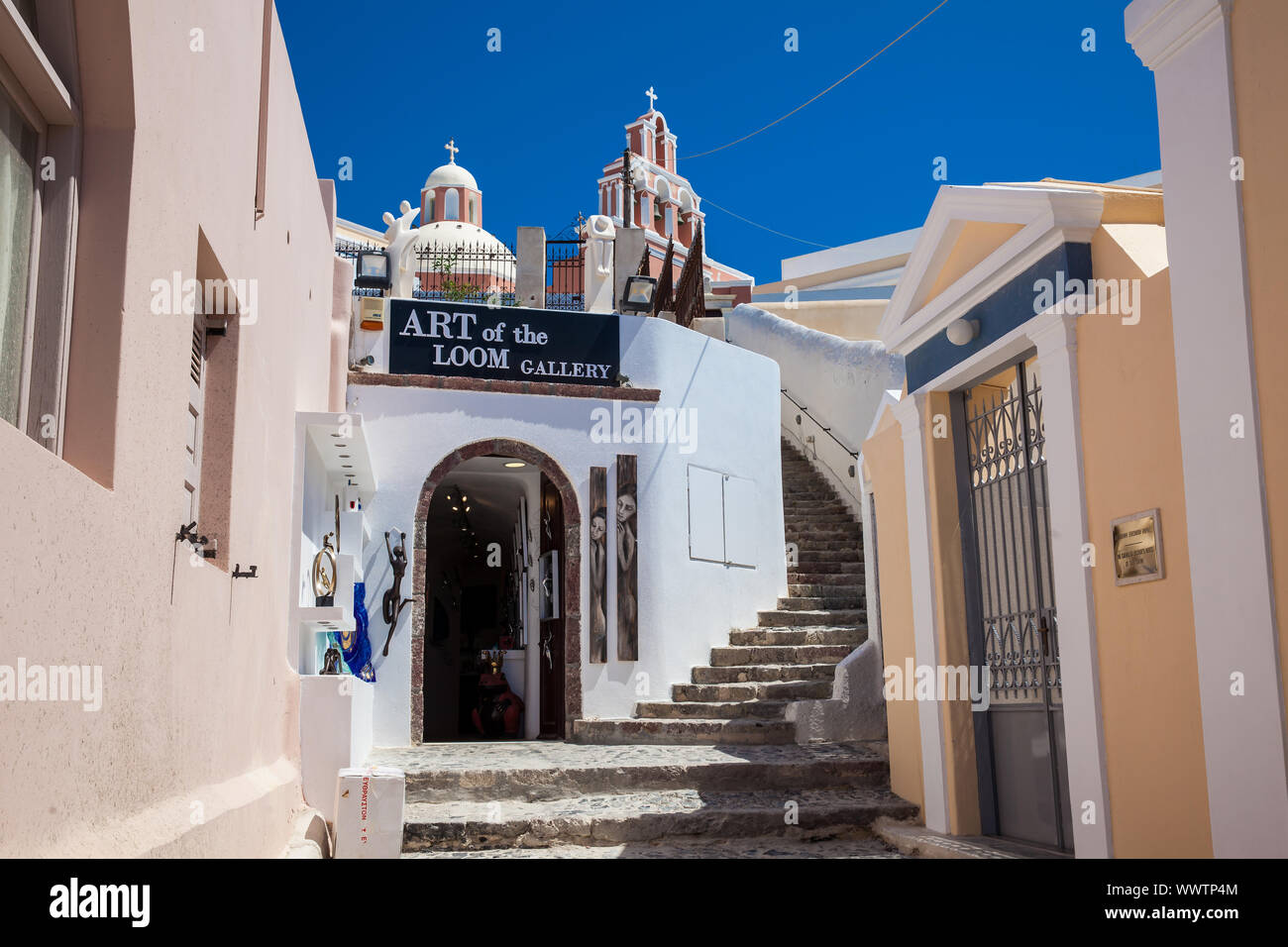 SANTORINI, GREECE - APRIL, 2018: Bell tower of the Catholic Monastery of  Dominican Nuns and beautiful alleys at Fira City in Santorini Stock Photo -  Alamy