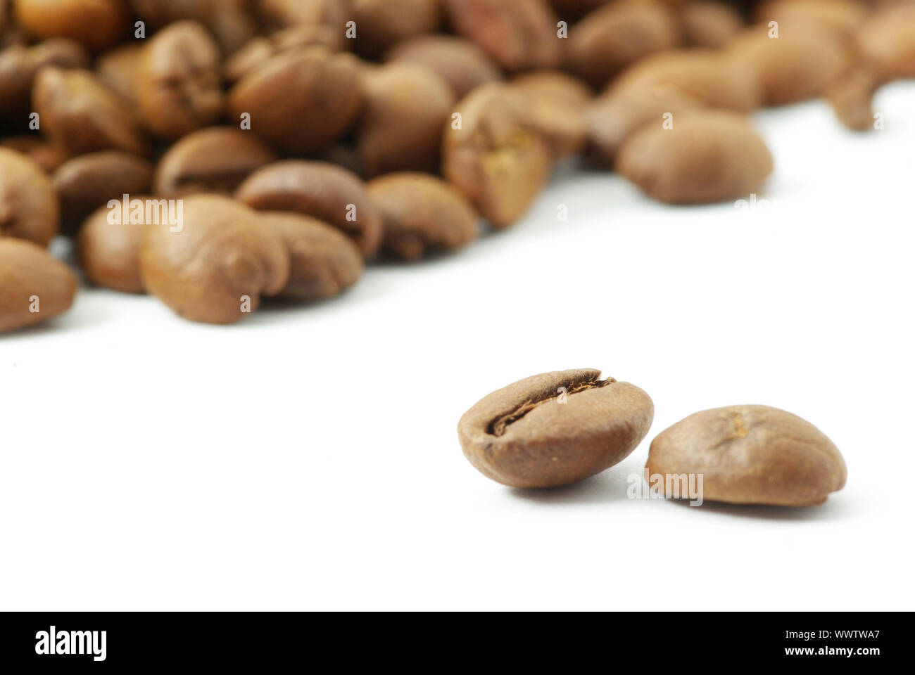 coffee beans isolated on a white background Stock Photo - Alamy