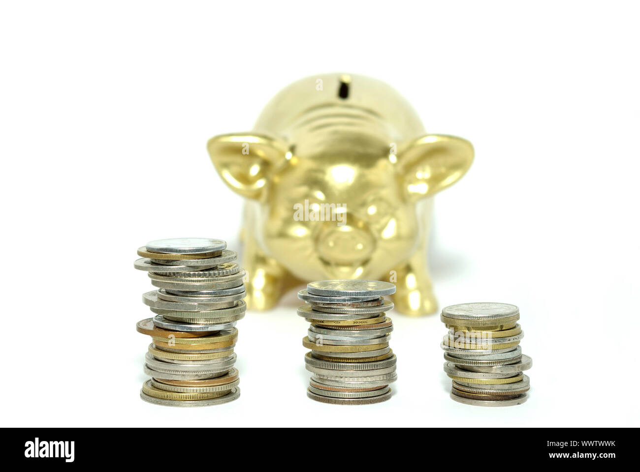 piggy bank isolated on white background with coins Stock Photo - Alamy