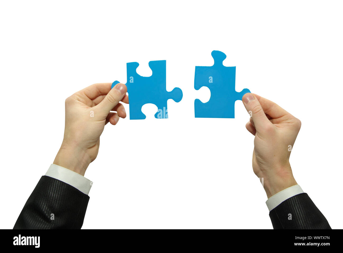 puzzle in hand isolated on white background Stock Photo - Alamy