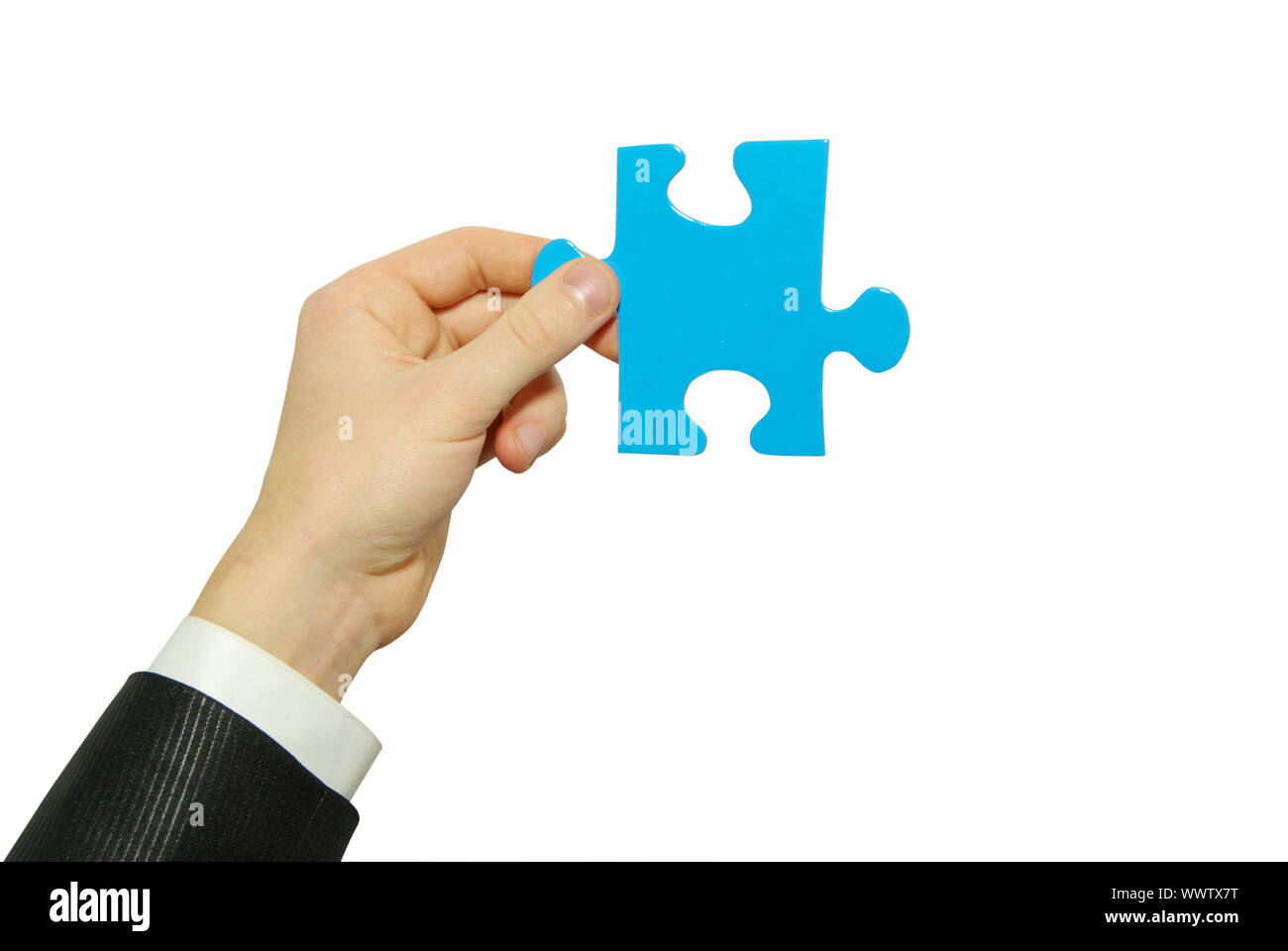 puzzle in hand isolated on white background Stock Photo - Alamy