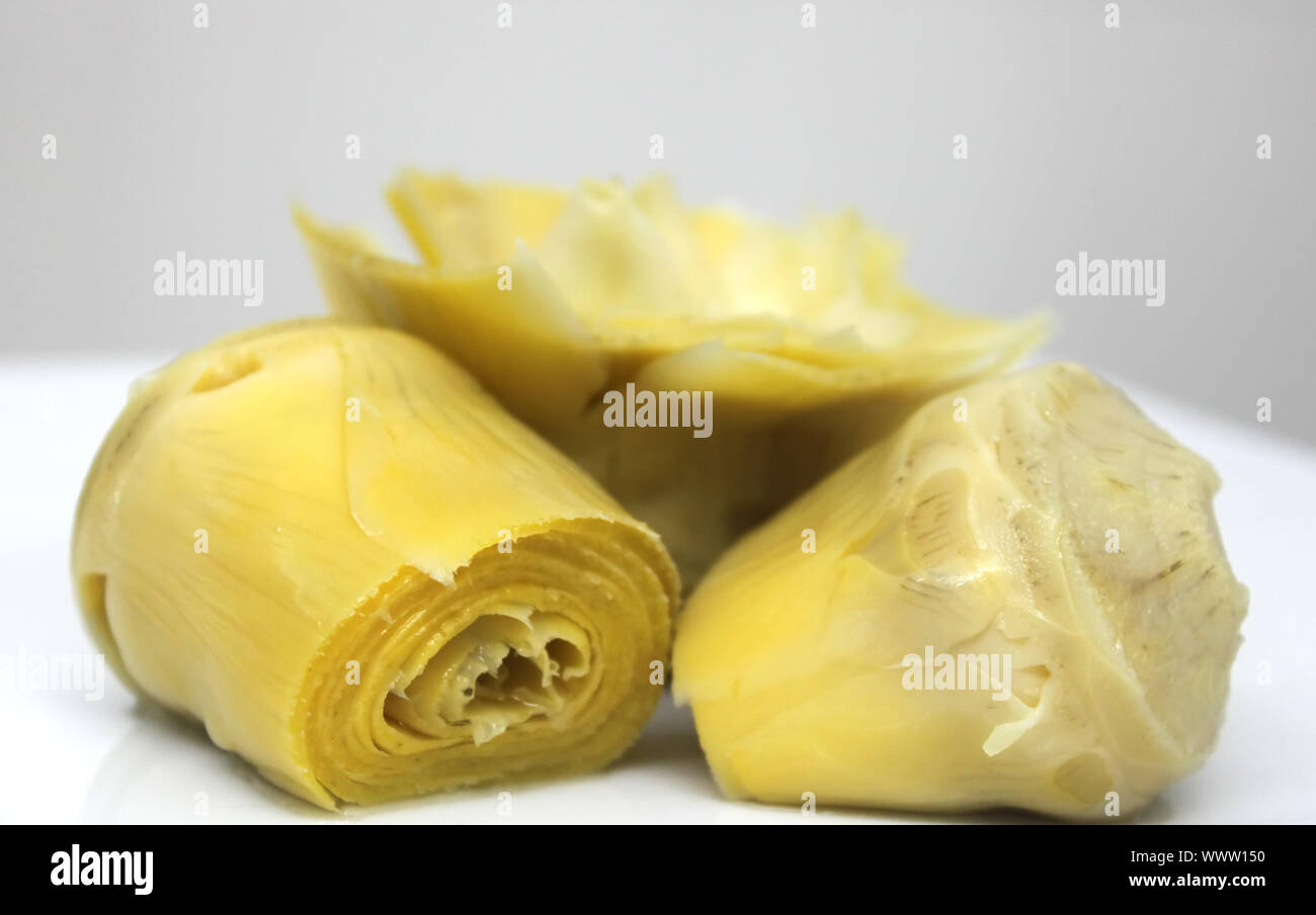 This is a photo of yellow preserved artichoke Stock Photo Alamy