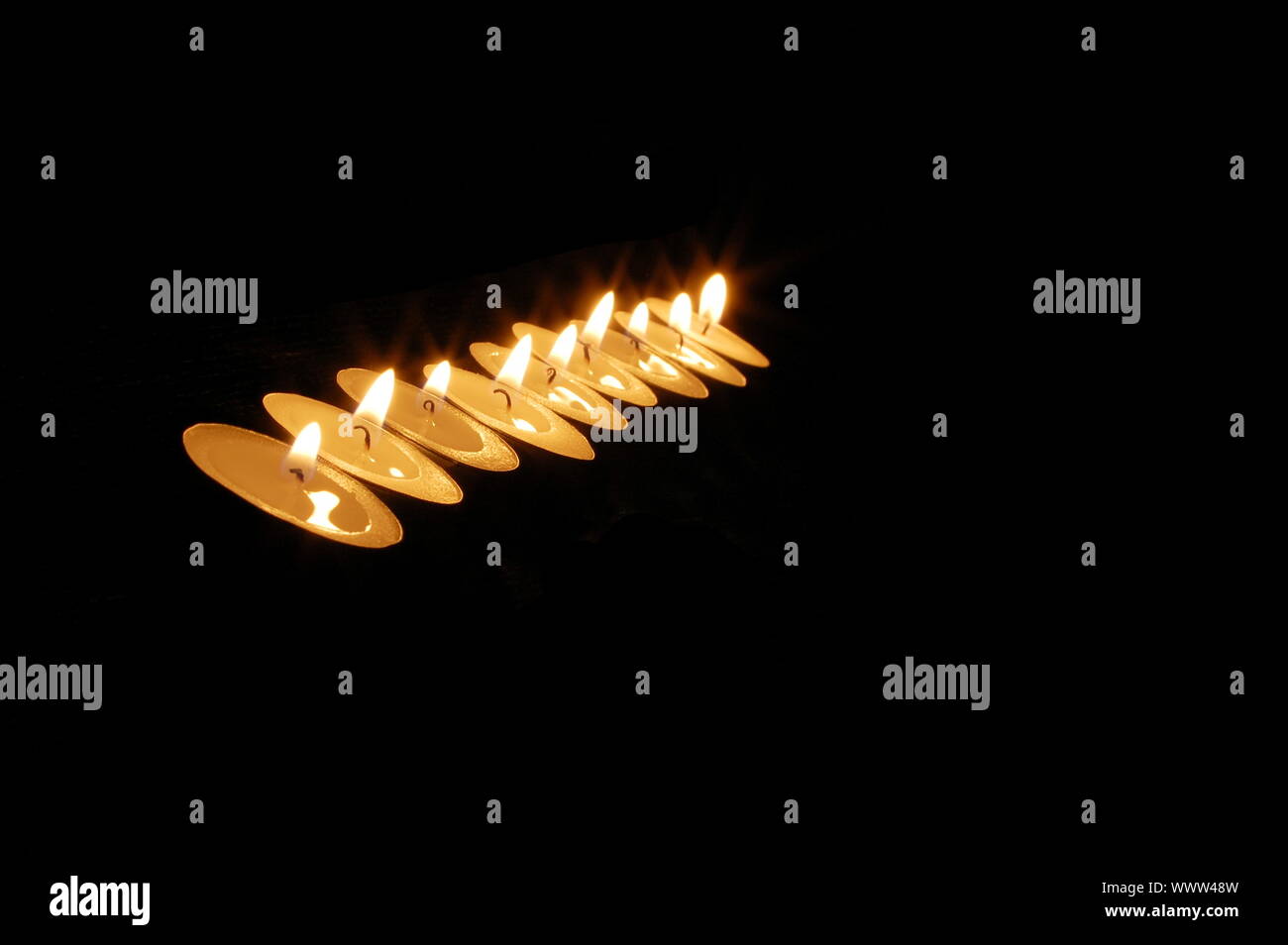 romantic candle light on a black background Stock Photo Alamy