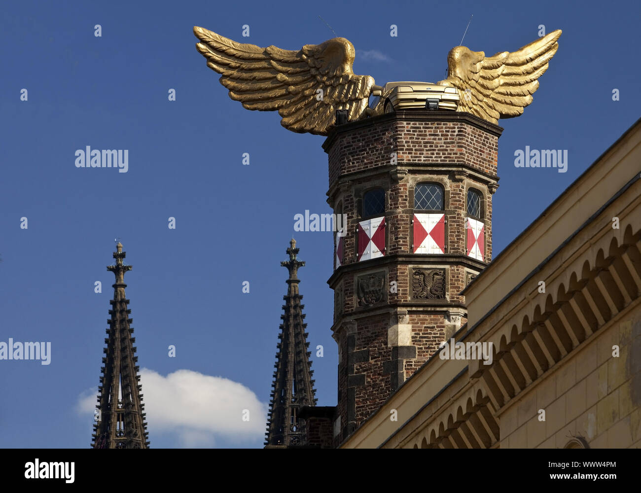 golden car with wings on the roof of municipal museum, Cologne, North Rhine-Westphalia, Germany Stock Photo