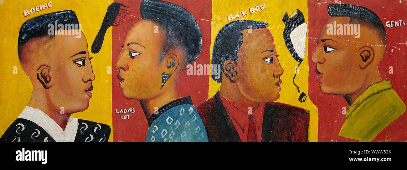 A colorful, humorous painted signboard shows hairstyle proposals in a barbershop. Republic of Mali Western Africa. Many businesses use such paintings as a visual lingua franca to communicate what goods they sell Stock Photo
