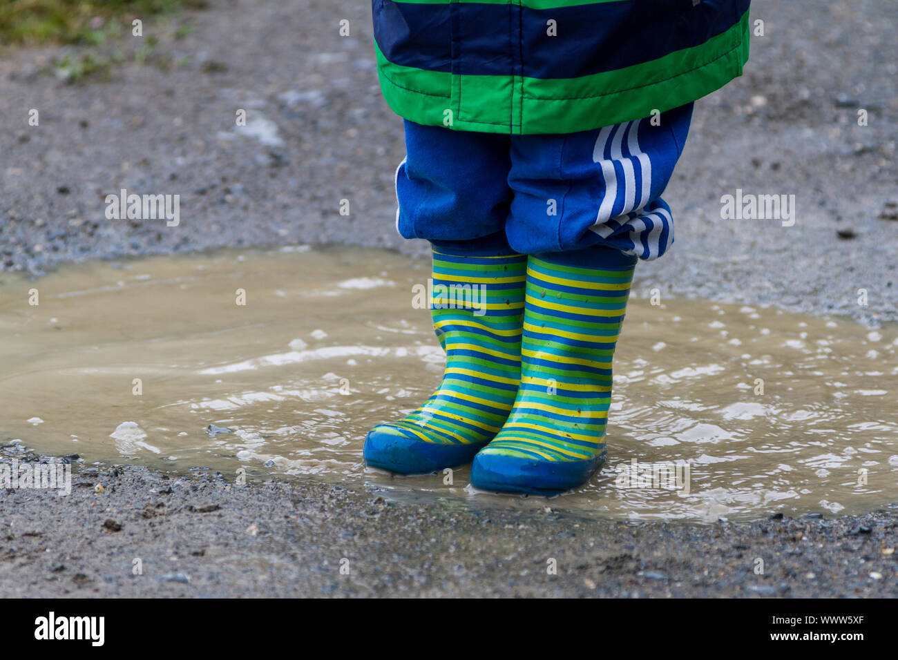 puddle child Stock Photo