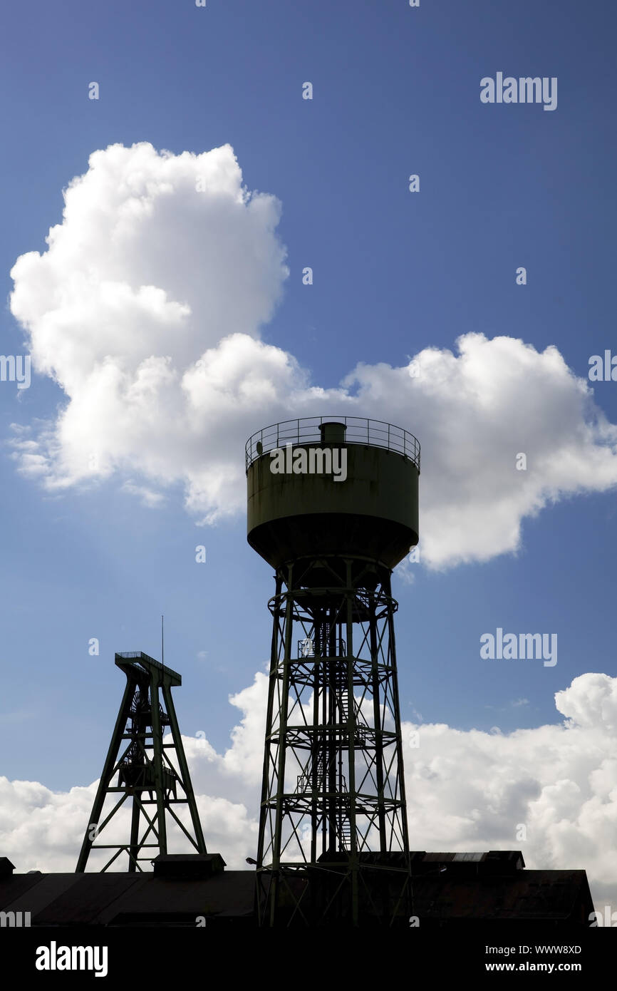 headgear and cooling tower of coal-mine Lohberg, Dinslaken, Ruhr Area, Germany, Europe Stock Photo