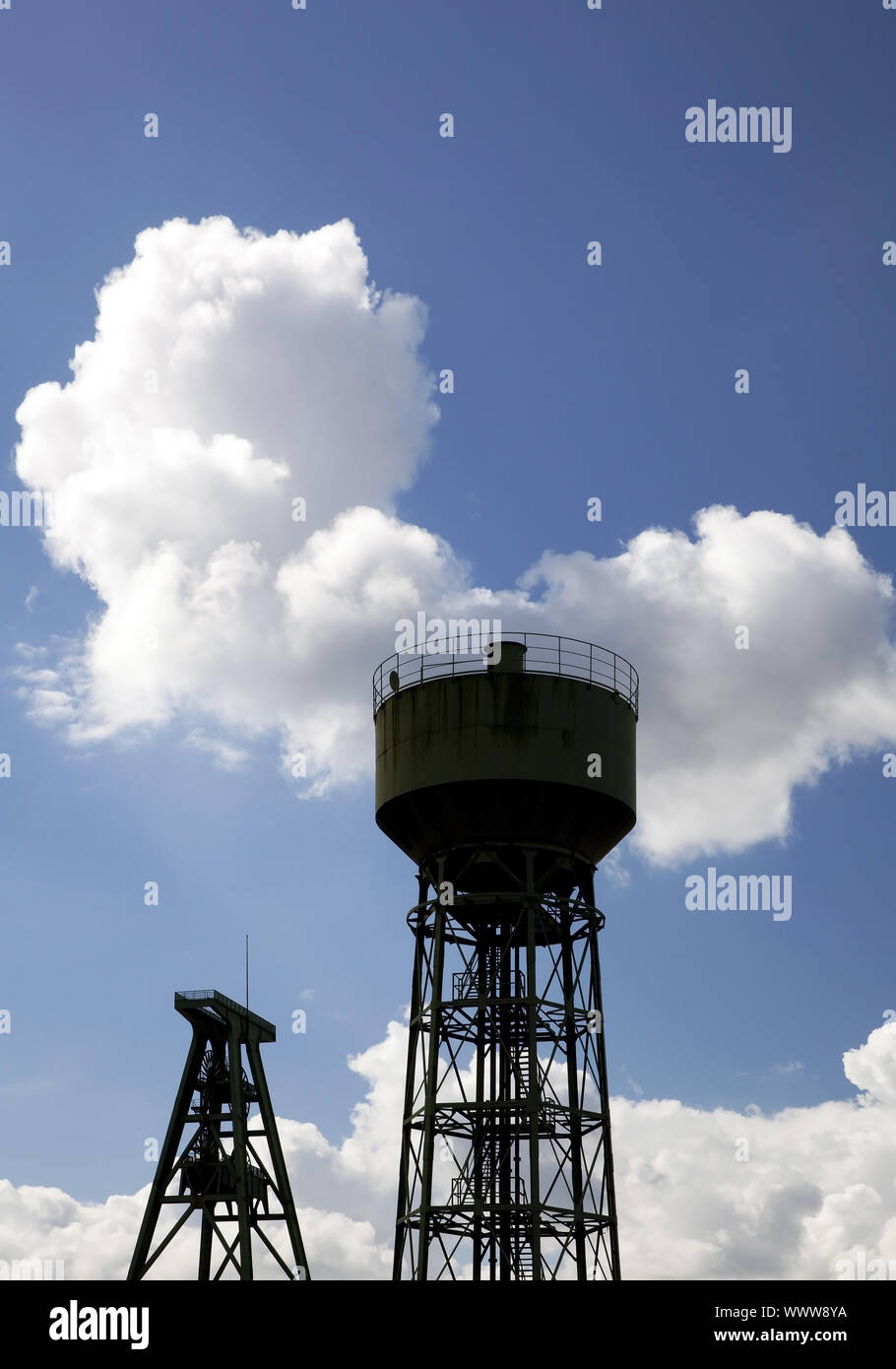 headgear and cooling tower of coal-mine Lohberg, Dinslaken, Ruhr Area, Germany, Europe Stock Photo