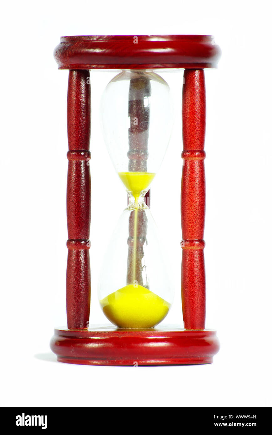 Sand clock with gold sand on white Stock Photo Alamy