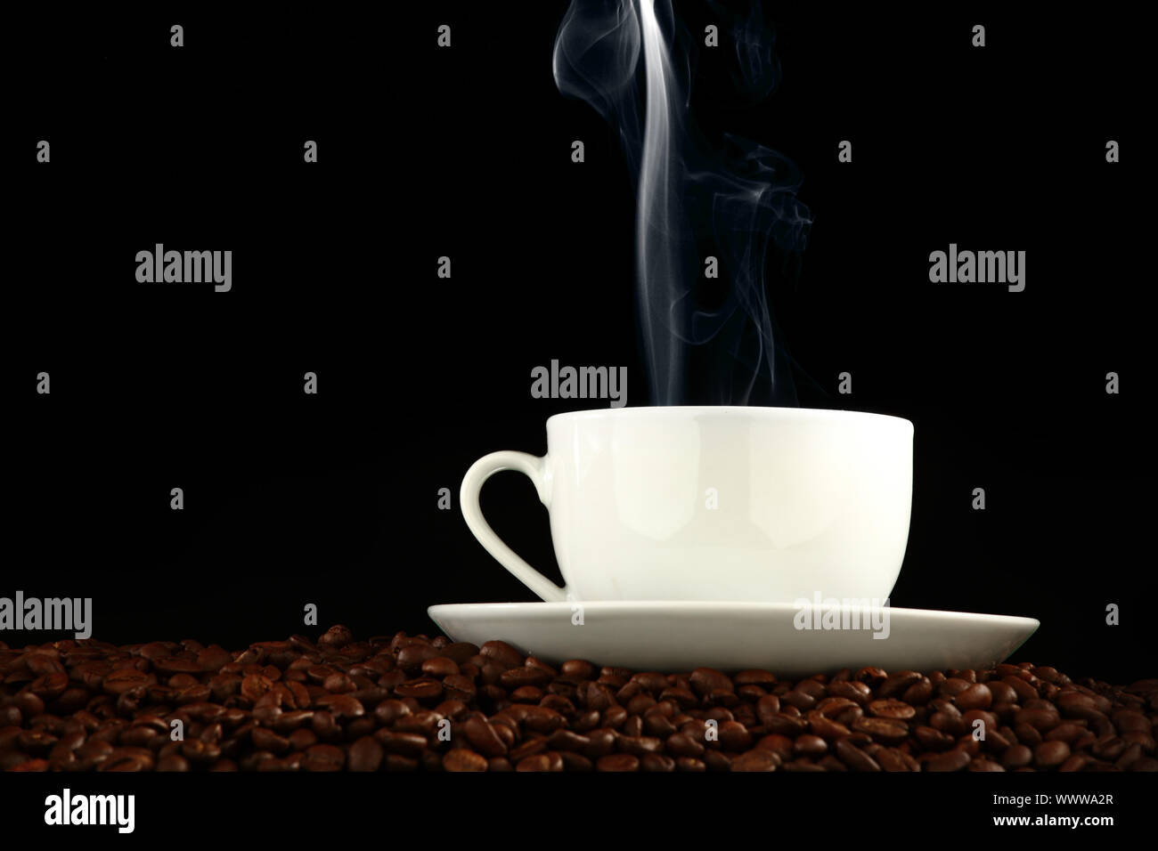coffee background aroma and beans on black Stock Photo - Alamy