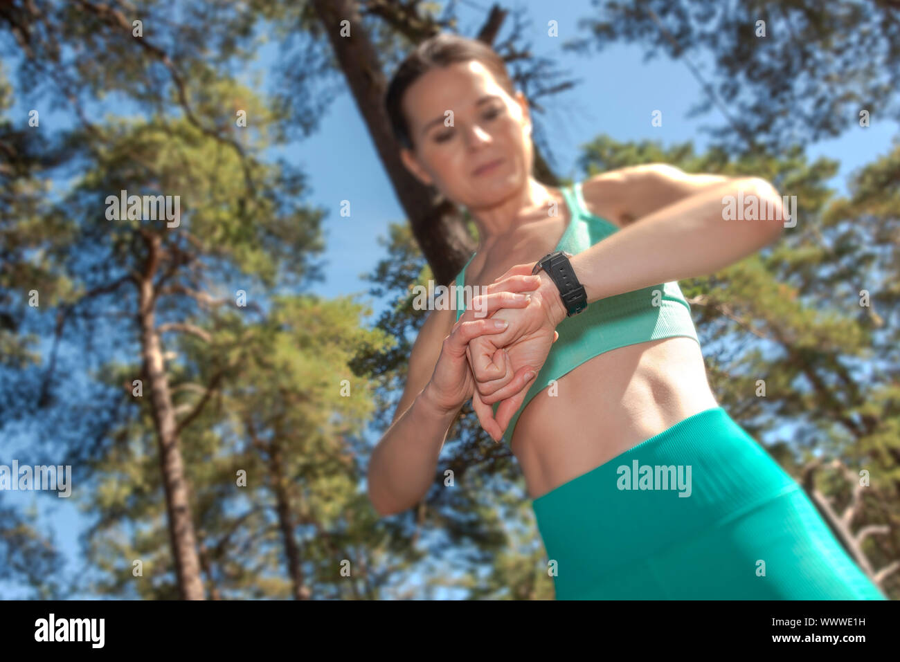 woman checking her fitness tracker watch Stock Photo