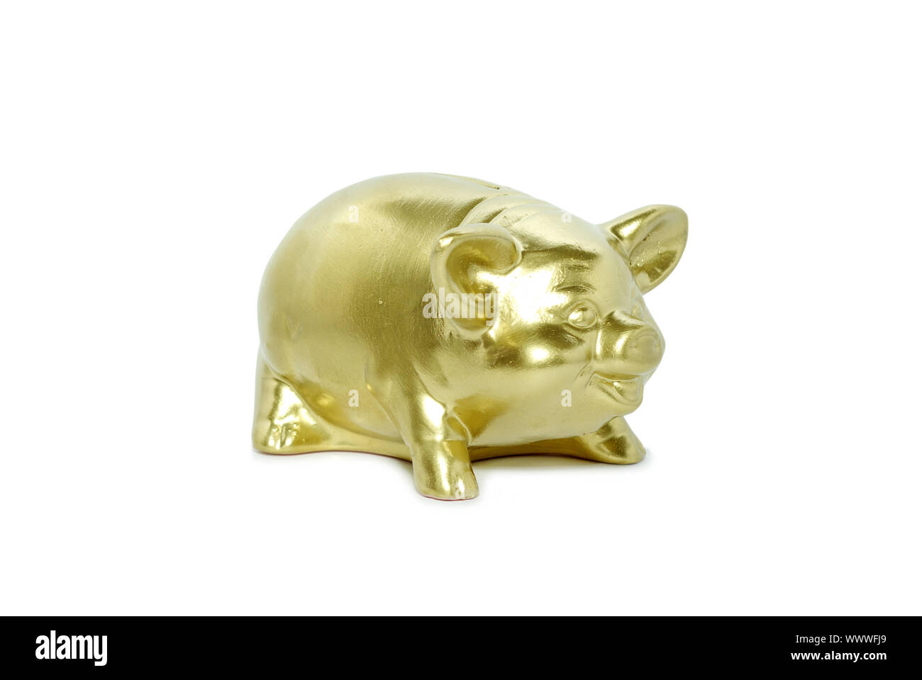 Golden piggy bank isolated on white Stock Photo - Alamy
