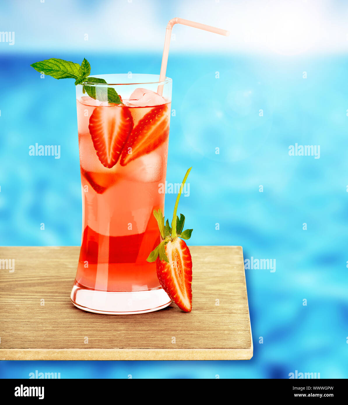 Strawberry juice on the poolside Stock Photo Alamy