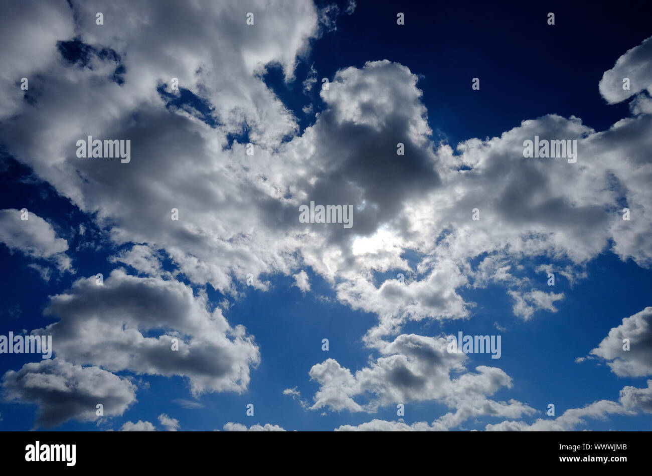 rain clouds on blue sky, norfolk, england Stock Photo
