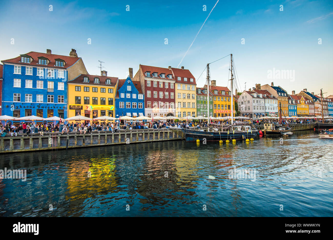 Nyhavn district is one of the most famous landmarks in Copenhagen, Denmark Stock Photo