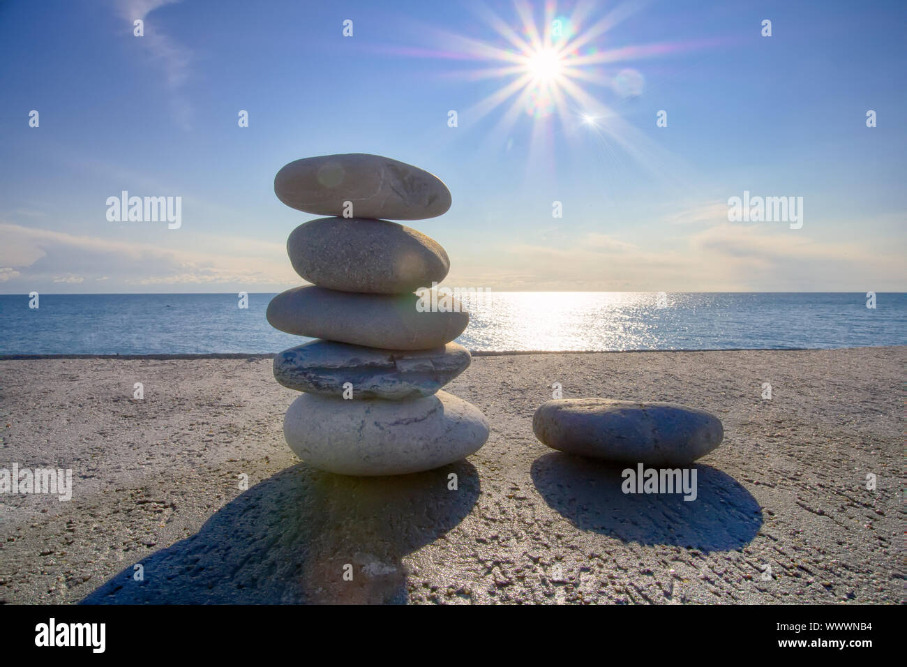 cone is formed of pebbles on seashore Stock Photo