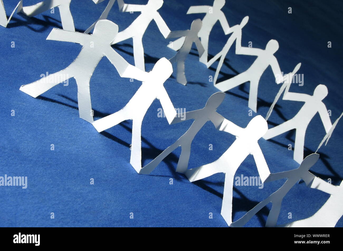 team of paper people having a party Stock Photo Alamy