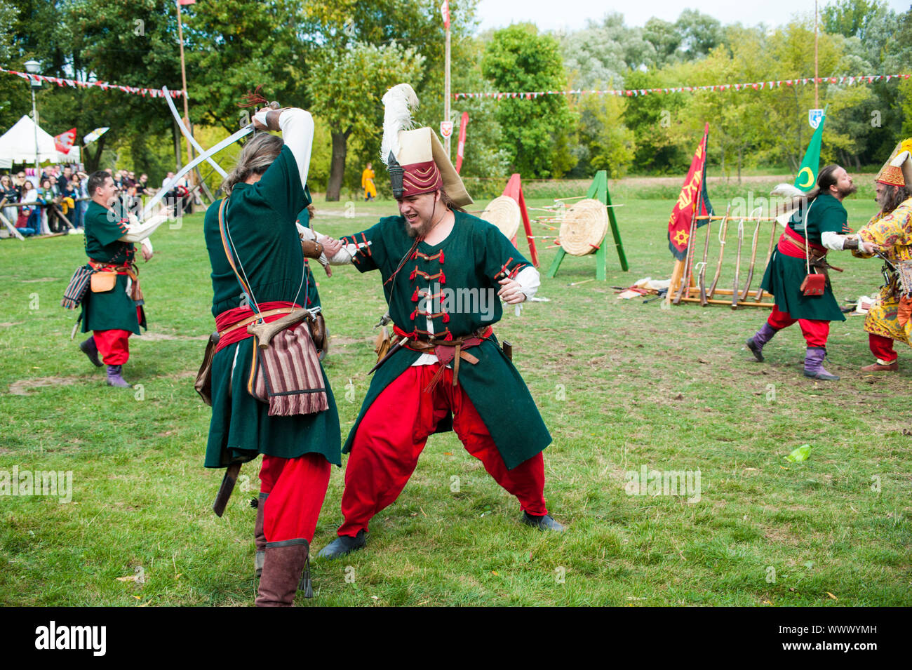 Live show by a Slovak group of performers depicting Turkish medieval soldiers in action. Historical festival at the Pultusk castle in central Poland, Stock Photo