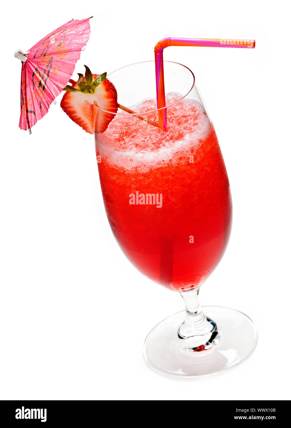 Strawberry daiquiri in glass isolated on white background with umbrella