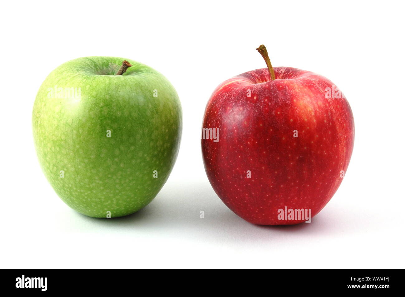 Red an green apples isolated on a white background Stock Photo - Alamy