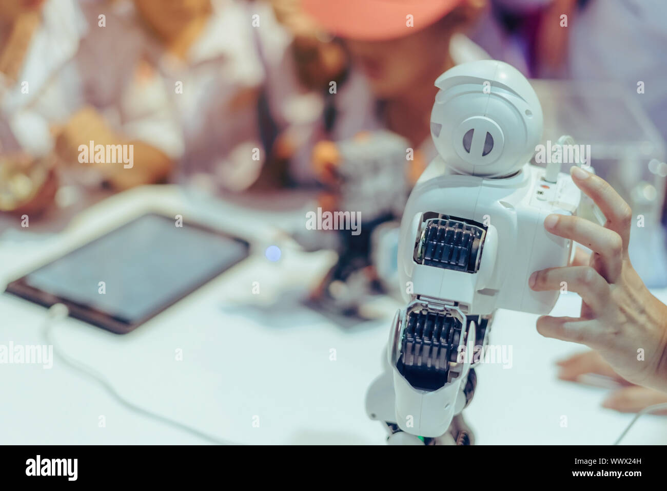 Students are testing robot control in an elementary school laboratory. Stock Photo