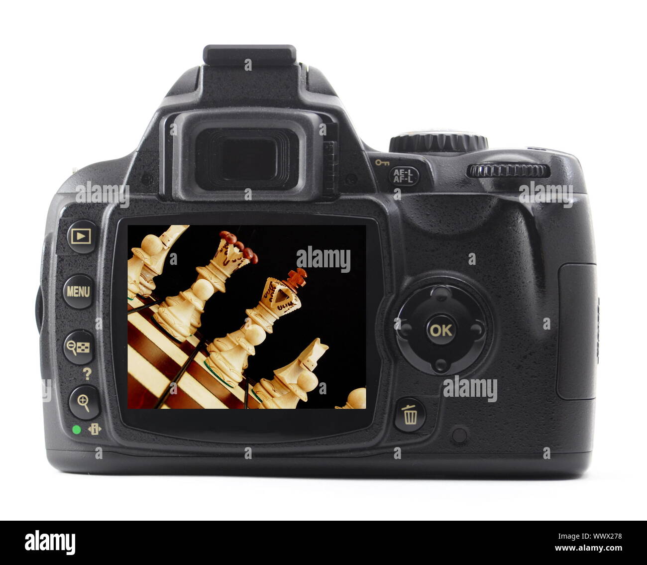 digital camera and chess pieces isolated on white background Stock ...