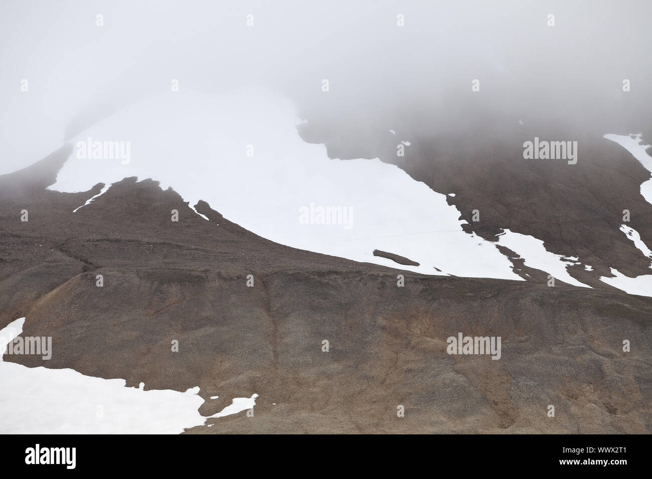 mountain with snow fields and fog, Kerlingarfjoell, Iceland, Europe Stock Photo