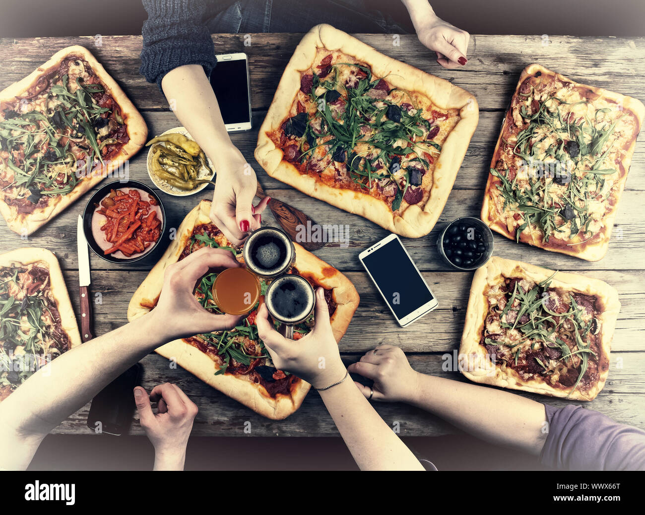 Eating Concept. Enjoying dinner with friends, Top view of group of