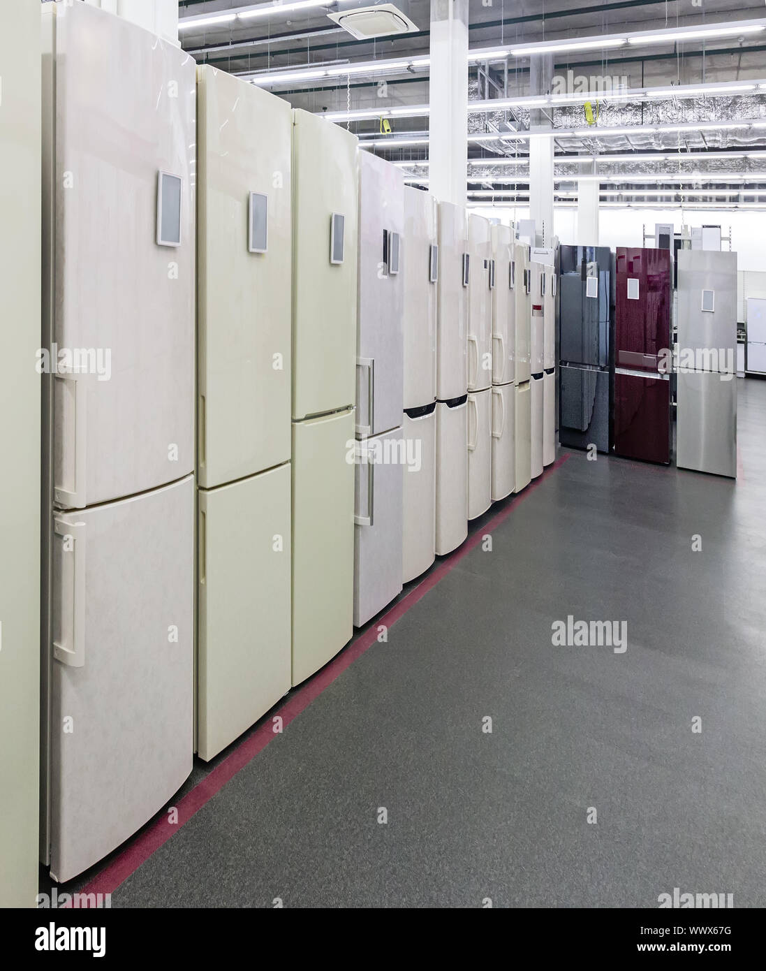 Fridges different models are sold in the store. Stock Photo