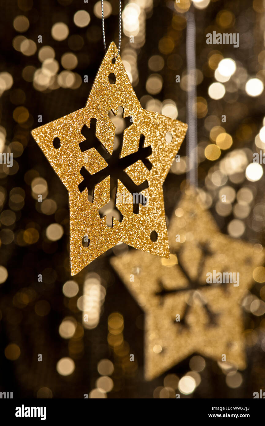 Artificial Snowflake in gold Stock Photo Alamy